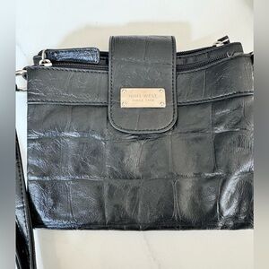 Nine west cross body. no marks on the inside, no rips or tears.